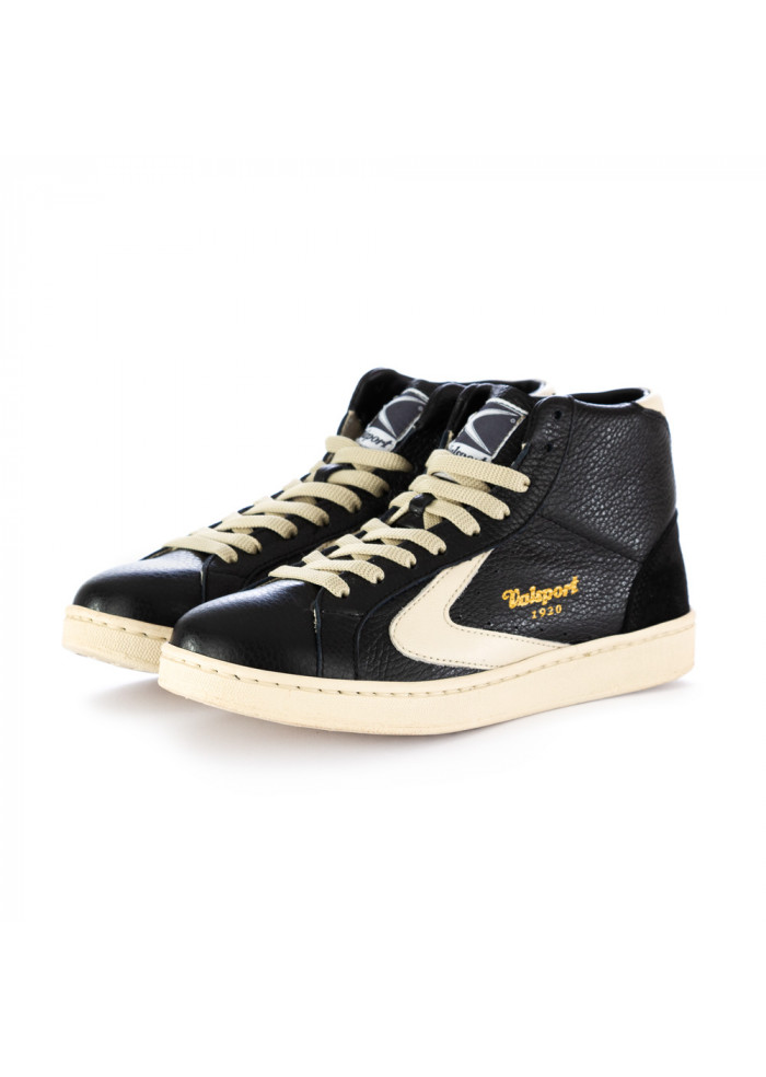 black and beige sneakers